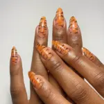 17 Tiger Print Nail Designs That Bring Bold Style And Energy To Your Spring Manicure