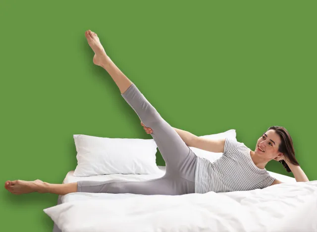 woman-side-lying-leg-lift-raises-on-a-bed_2614597389